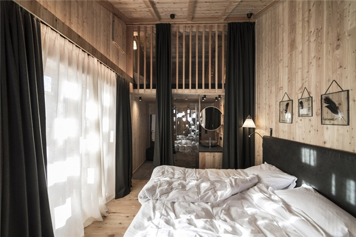 意大利雪山里的Zallinger现代木屋酒店设计案例